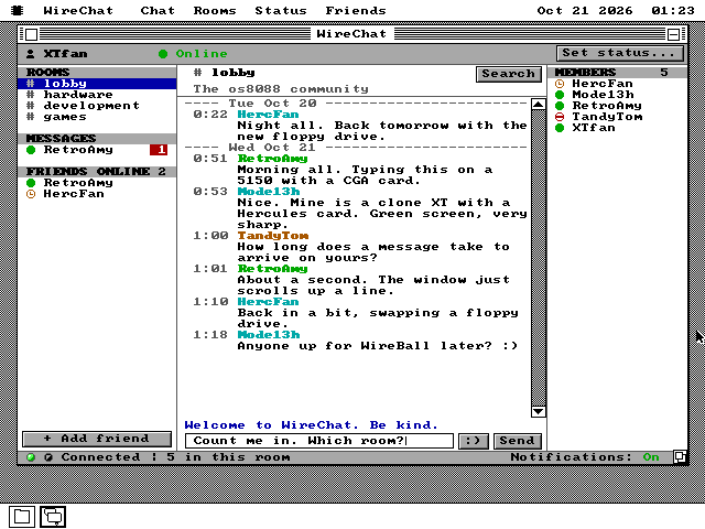 The WireChat window in colour on VGA: four rooms and a private conversation with a red unread badge on the left, the lobby's messages with each nick in its own colour in the middle, and five members with coloured status marks on the right.